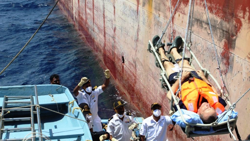 The critically ill crew being disembarked from a Liberian flag vessel at Kavaratti Island. Photo credit: ICG.