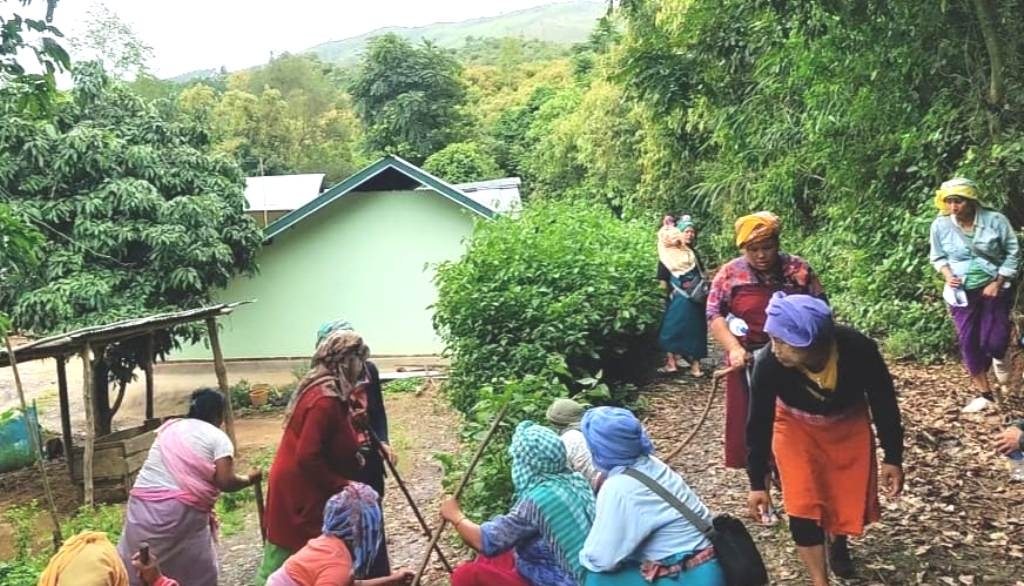 Meira Paibis, shrouded in fear, instinctively cower as the echoes of gunshots pierce the air, fired by suspected Kuki Militants in Tairenpokpi - Imphal Times photo by Aribam Bishwajit